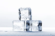 Ice cubes on wet surface